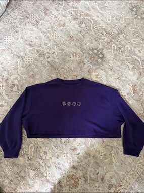 Cyclebar Purple Cropped Sweatshirt with Smiley Icons